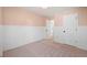 Bedroom with wainscoting, neutral walls, and plenty of natural light at 139 Thunder Ridge Ln, Acworth, GA 30101