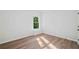 Bright bedroom with natural light, wood floors, and neutral wall color at 139 Thunder Ridge Ln, Acworth, GA 30101