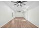 Large living room with ample natural light, wood floors, and recessed lighting at 139 Thunder Ridge Ln, Acworth, GA 30101