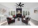 Cozy living room with a fireplace and ample seating for entertaining at 139 Thunder Ridge Ln, Acworth, GA 30101