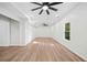 Spacious living room with wood floors, recessed lighting, and a modern ceiling fan at 139 Thunder Ridge Ln, Acworth, GA 30101