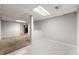 Partially finished basement with both carpeted and tiled areas, offering flexible living space at 1415 Hialeah Ct, Marietta, GA 30062