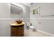 Bathroom with custom sink, wood vanity and light gray walls at 1415 Hialeah Ct, Marietta, GA 30062