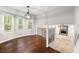 Bright dining area with hardwood floors, neutral tones, and staircase views to the lower level at 1415 Hialeah Ct, Marietta, GA 30062