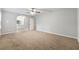 Large main bedroom with neutral carpet leading to a bathroom at 1415 Hialeah Ct, Marietta, GA 30062