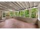 Enclosed back porch, ideal for enjoying the outdoors comfortably at 1415 Hialeah Ct, Marietta, GA 30062