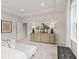 Bright bedroom with natural light, decor, and neutral tones at 4014 Dantry Ln, Buford, GA 30519
