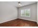 Bedroom with hardwood floors and large window providing natural light at 3139 Hilltop Drive, Marietta, GA 30066