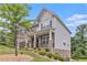 Charming two-story home with brick and siding, set on a well-manicured lawn at 3139 Hilltop Drive, Marietta, GA 30066