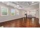 Spacious living room with hardwood floors, coffered ceilings, and an open concept kitchen at 3139 Hilltop Drive, Marietta, GA 30066