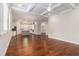 Open concept living room featuring hardwood floors, neutral paint, and a modern kitchen at 3139 Hilltop Drive, Marietta, GA 30066