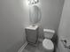 Clean and modern half-bathroom with updated fixtures at 1753 Cahoon Sw St, Atlanta, GA 30310