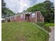 Charming brick home with a well-maintained lawn and mature trees at 1753 Cahoon Sw St, Atlanta, GA 30310