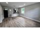 Open-concept living room flowing into the kitchen area, perfect for entertaining at 1753 Cahoon Sw St, Atlanta, GA 30310