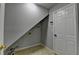 Unfinished basement with tile floor, doorway and utility connections at 1965 Sterling Creek Ct, Snellville, GA 30078