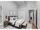 Bedroom with hardwood floors, a double-door closet and stylish decor at 1965 Sterling Creek Ct, Snellville, GA 30078