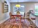 Cozy dining area with natural light, and access to the kitchen, perfect for Gathering meals at 2210 Cumberland Se Ct, Smyrna, GA 30080