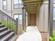 Welcoming entrance with stairs leading to the front door of a cozy condo unit at 2210 Cumberland Se Ct, Smyrna, GA 30080