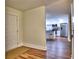 Inviting foyer with view of the kitchen featuring wood floors and a neutral color palette at 2210 Cumberland Se Ct, Smyrna, GA 30080