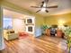 Inviting living area boasting a fireplace, TV, modern ceiling fan, and seamless flow into a well-equipped workspace at 2210 Cumberland Se Ct, Smyrna, GA 30080