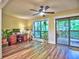 Bright office space with hardwood floors, views of lush greenery, functional furniture, and natural light at 2210 Cumberland Se Ct, Smyrna, GA 30080