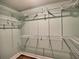 Spacious walk-in closet with built-in shelving and ample storage for an organized wardrobe at 2210 Cumberland Se Ct, Smyrna, GA 30080