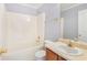 Cozy bathroom featuring a tub-shower, toilet, single vanity, and gold fixtures at 4001 English Valley Dr, Ellenwood, GA 30294