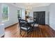 Elegant dining room featuring hardwood floors, a chandelier, and classic decor at 4001 English Valley Dr, Ellenwood, GA 30294