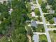 Overhead aerial view of the property, highlighting its surroundings, landscaping, driveway, and neighborhood at 464 Mason Dr, Canton, GA 30115