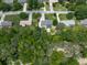 Overhead aerial view of the property showcasing landscaping, driveway, and its position in the neighborhood at 464 Mason Dr, Canton, GA 30115