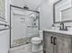 Modern bathroom with a glass-enclosed shower, stylish vanity, and neutral color scheme, perfect for relaxation at 464 Mason Dr, Canton, GA 30115