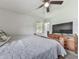 Spacious bedroom with a rustic bed, flat screen TV, and plenty of room to move around and relax at 464 Mason Dr, Canton, GA 30115