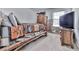 A unique bedroom with a rustic-themed bed, a large TV, and decorative wooden accents for a cozy retreat at 464 Mason Dr, Canton, GA 30115