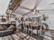 Open concept dining room features hardwood floors, ceiling fan and access to the living room at 464 Mason Dr, Canton, GA 30115