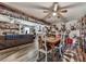 Open concept dining room features hardwood floors, ceiling fan and access to the living room at 464 Mason Dr, Canton, GA 30115