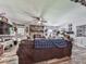 Inviting living room features hardwood floors, stone fireplace, ceiling fan and unique decor at 464 Mason Dr, Canton, GA 30115