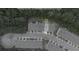 Aerial view of townhomes in a wooded area, with estimated property lines at 5095 Lower Elm St, Atlanta, GA 30349