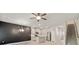 Bright, open-concept space featuring kitchen, living room, and stairs to the second floor at 5095 Lower Elm St, Atlanta, GA 30349