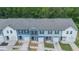Aerial view of new construction townhomes with varied siding colors at 5095 Lower Elm St, Atlanta, GA 30349