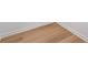 Close up of newly installed light brown wooden floors at 545 Willow Creek Dr, Temple, GA 30179