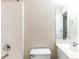 Bathroom showcasing a shower-tub combination and a single sink vanity with a large mirror at 1646 Sandy Beach Pt, Lawrenceville, GA 30043