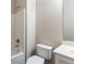 Neutral toned bathroom featuring a sink vanity, mirror and standard toilet and shower/tub at 1646 Sandy Beach Pt, Lawrenceville, GA 30043