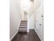 Inviting entryway with hardwood floors, staircase, and fresh paint, creating a welcoming atmosphere at 1646 Sandy Beach Pt, Lawrenceville, GA 30043