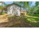 An exterior view of the backyard with mature trees at 2133 Trailwood Rd, Decatur, GA 30032