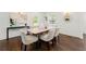A stylish dining room features wood floors and modern decor at 2133 Trailwood Rd, Decatur, GA 30032