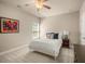 Bedroom with a bed and colorful artwork at 2700 Vinings Orchard Cir, Atlanta, GA 30339