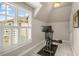 Home gym with exercise bike and bright windows, perfect for staying active at 2700 Vinings Orchard Cir, Atlanta, GA 30339