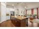 Kitchen featuring a center island with seating and an open floorplan at 2700 Vinings Orchard Cir, Atlanta, GA 30339