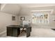 Bright office space with lots of natural light from large windows and a black desk at 2700 Vinings Orchard Cir, Atlanta, GA 30339
