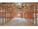Expansive unfinished basement with exposed studs, concrete flooring, and natural light ready for personalization at 2740 Heritage Bend Sw Ct, Grayson, GA 30017